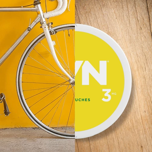 The right half of a citrus ZYN can that is matching up with a bike wheel on the left half.