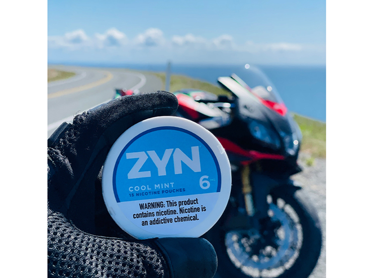 ZYN Across America winning submission of a cool mint 6 ZYN can with a red motorcycle in the background. 