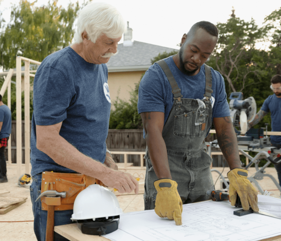 Two Men Looking at Blueprints